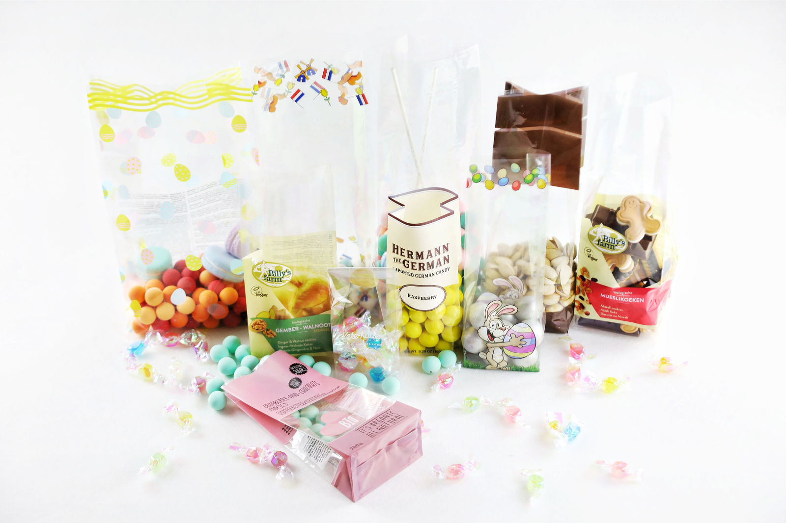 A variety of products packaged in crystal clear OPP bags, such as cookies, greeting cards, and popcorn.