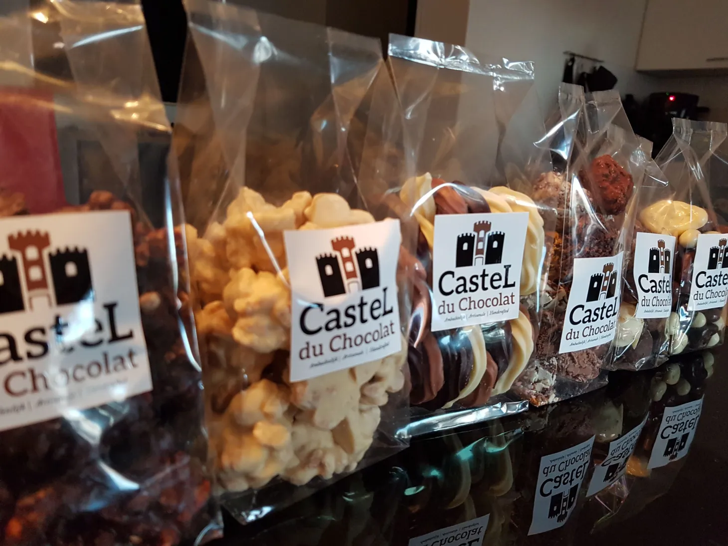A row of perfectly standing OPP block bottom bags on a retail shelf, looking neat and attractive.